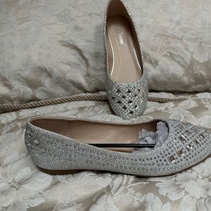 Dressy silver flat shoes